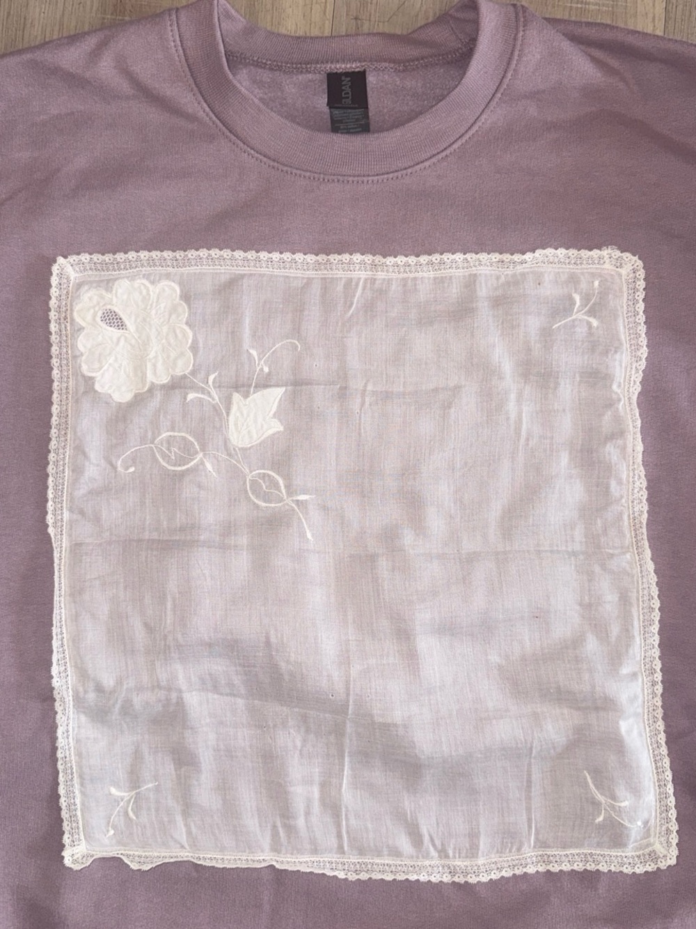 Upcycled vintage handkerchief sewn onto a gildan crewneck
